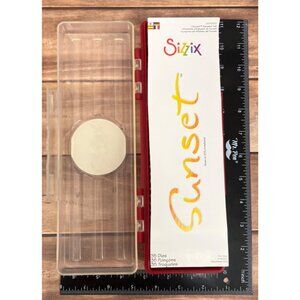 Lightly used Sizzix Sunset Alphabet Die Set With Case